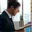 Consultant advising clients over digital device